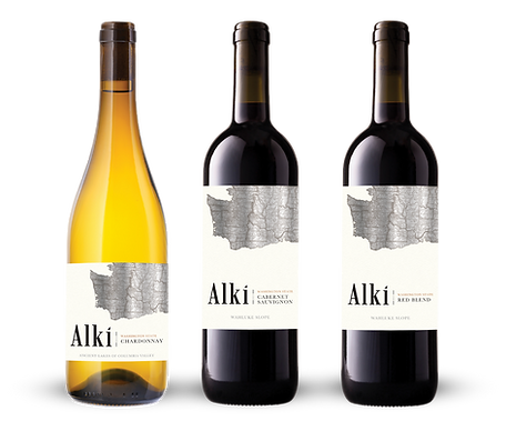 Alki-btl graphic Three Alki wine bottles: an Alki Chardonnay, an Alki Cabernet Sauvignon, and a Red Blend with white labels.