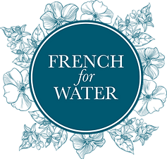 Blue circle with French for Water text, surrounded by a delicate floral decorative design in the background.