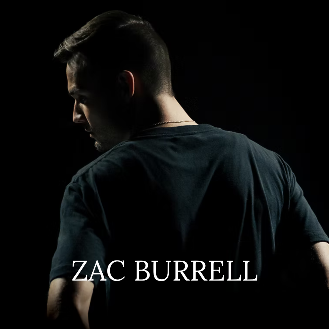 A man in a dark shirt stands with his back turned; Zac Burrell is written at the bottom.