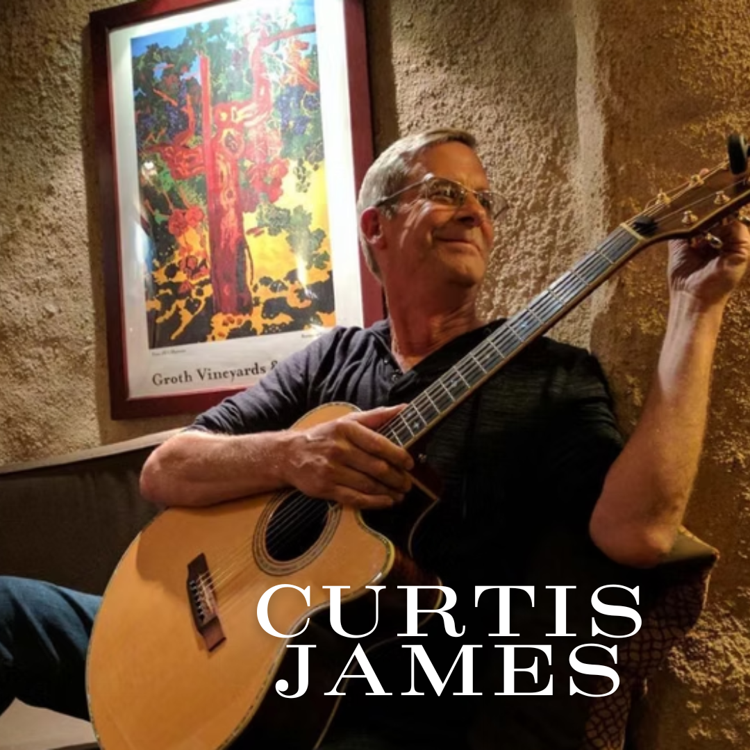 Smiling man tunes an acoustic guitar, seated by art and a &ldquo;Groth Vineyards&rdquo; poster; text reads Curtis James.