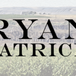 Large black text RYAN PATRICK over a background of vineyards and hills under a cloudy sky.